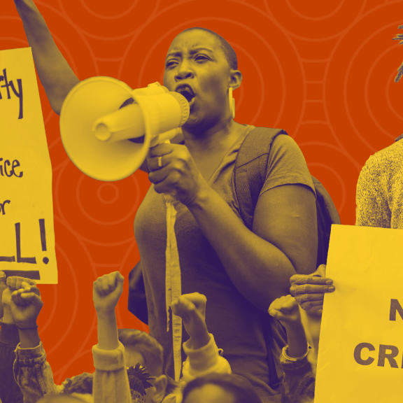 Defiant orange protest graphic shows a woman with a megaphone, raised fists, and signs reading “Liberty and Justice for ALL!” and “I AM NOT A CRIMINAL.”