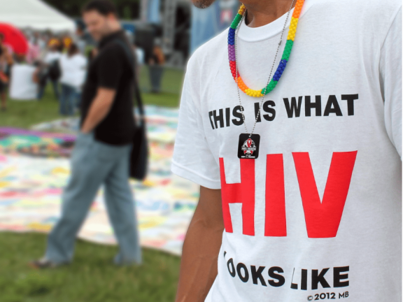 Man Wearing T-Shirt that Reads This is What HIV Looks Like