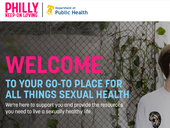 Screenshot of phillykeeponloving.com with a photo of two men smiling with pink and blue logos and letters welcoming to your go-to place for all things sexual health.