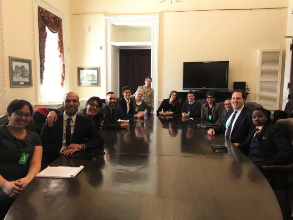 People around a large desk at  LGBT Criminal Justice Federal Working Group Meeting with DPC at White House April 2016