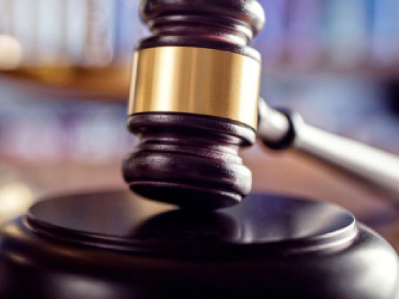 Judge's gavel on a desk.