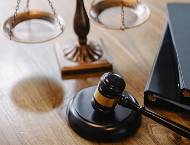 judge's gavel on a wooden desk